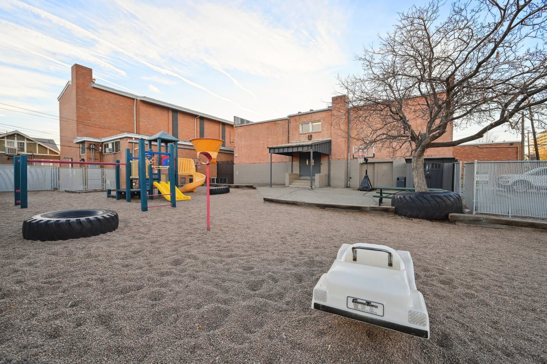 Playground beside a community-serving campus