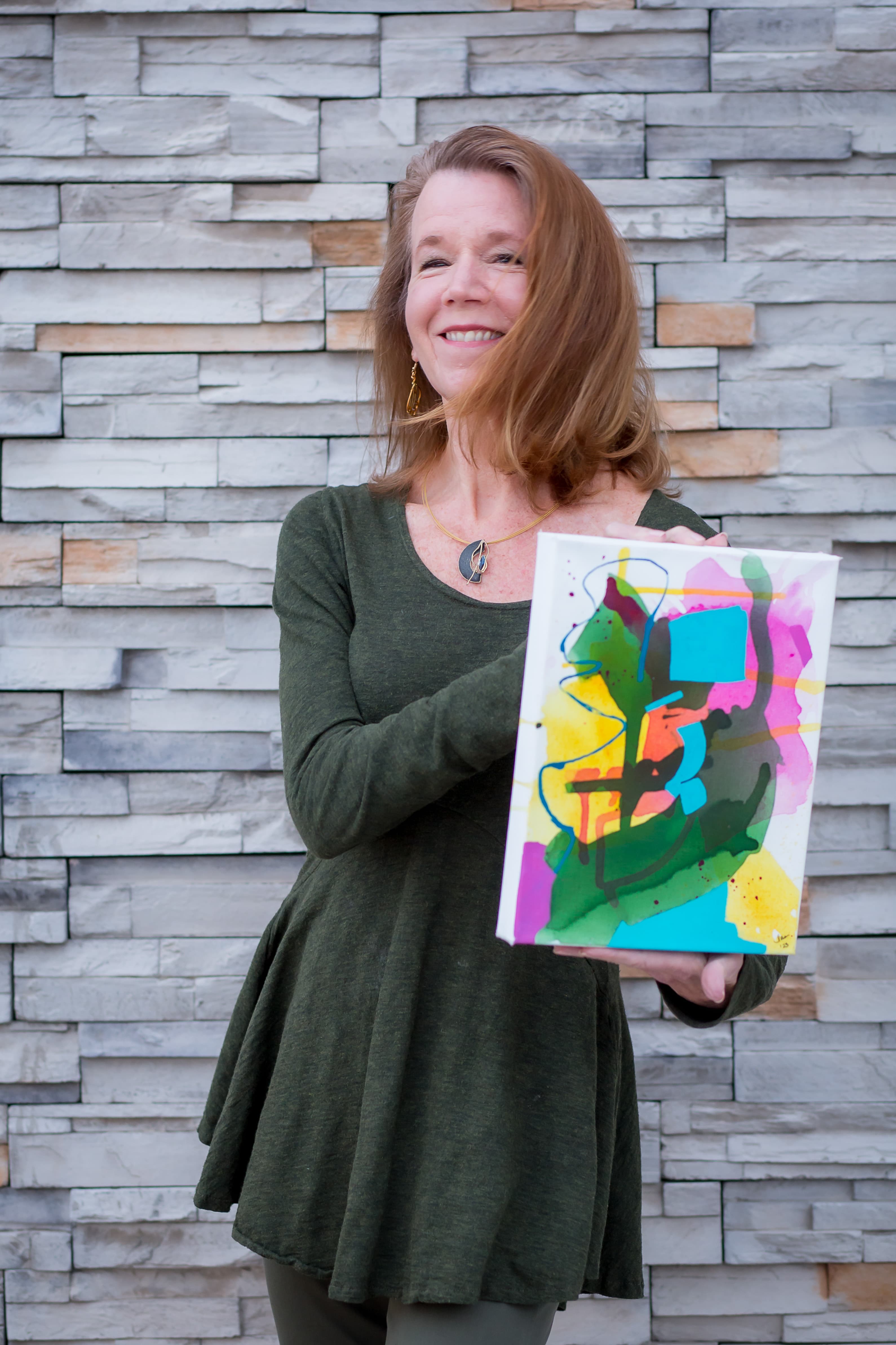 Lisa Snead sharing one of her paintings